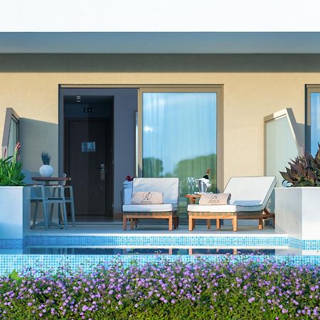 Ammoa Luxury Hotel & Spa Resort Nikiti  Exterior foto A typical room at the hotel