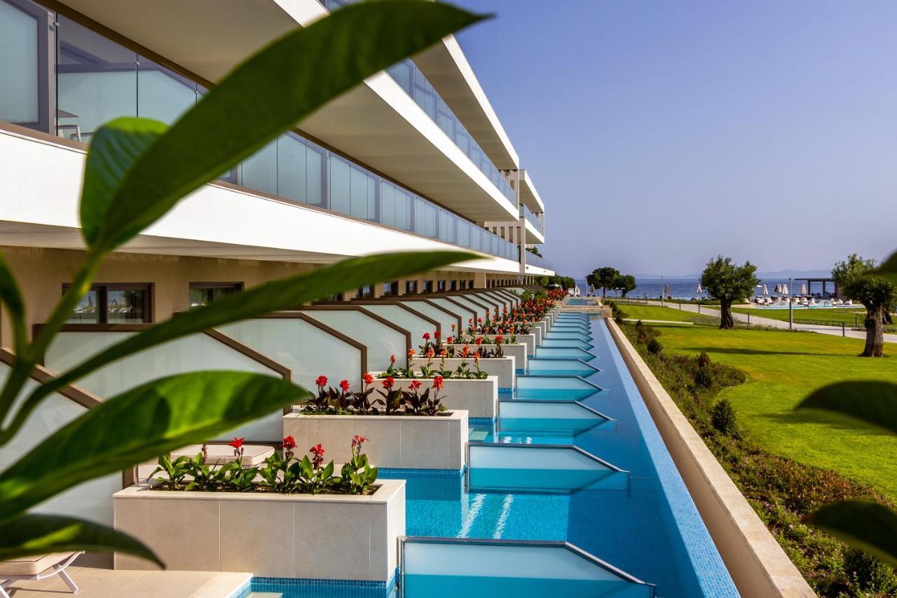 Ammoa Luxury Hotel & Spa Resort Nikiti  Exterior foto The hotel's swimming pool
