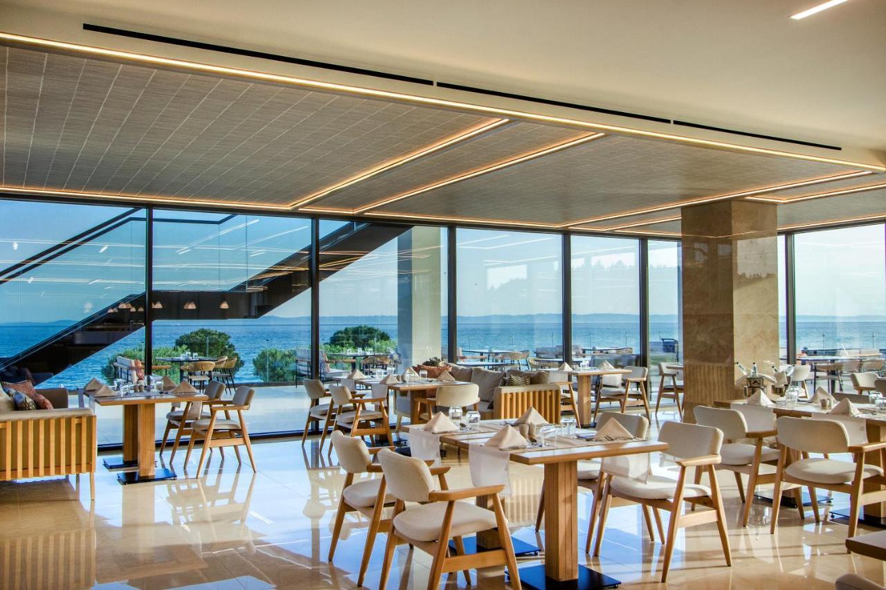 Ammoa Luxury Hotel & Spa Resort Nikiti  Exterior foto The restaurant