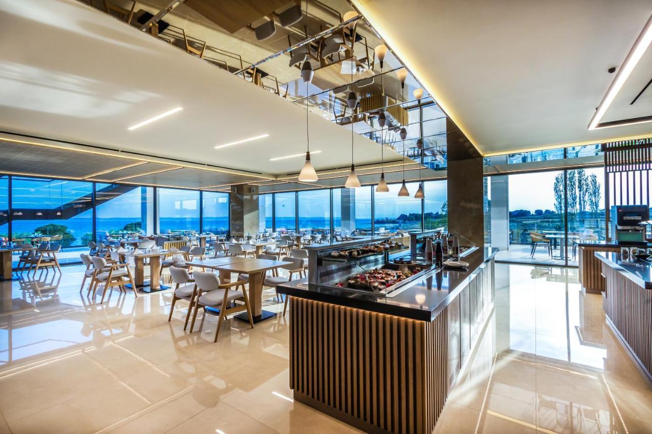 Ammoa Luxury Hotel & Spa Resort Nikiti  Exterior foto The restaurant