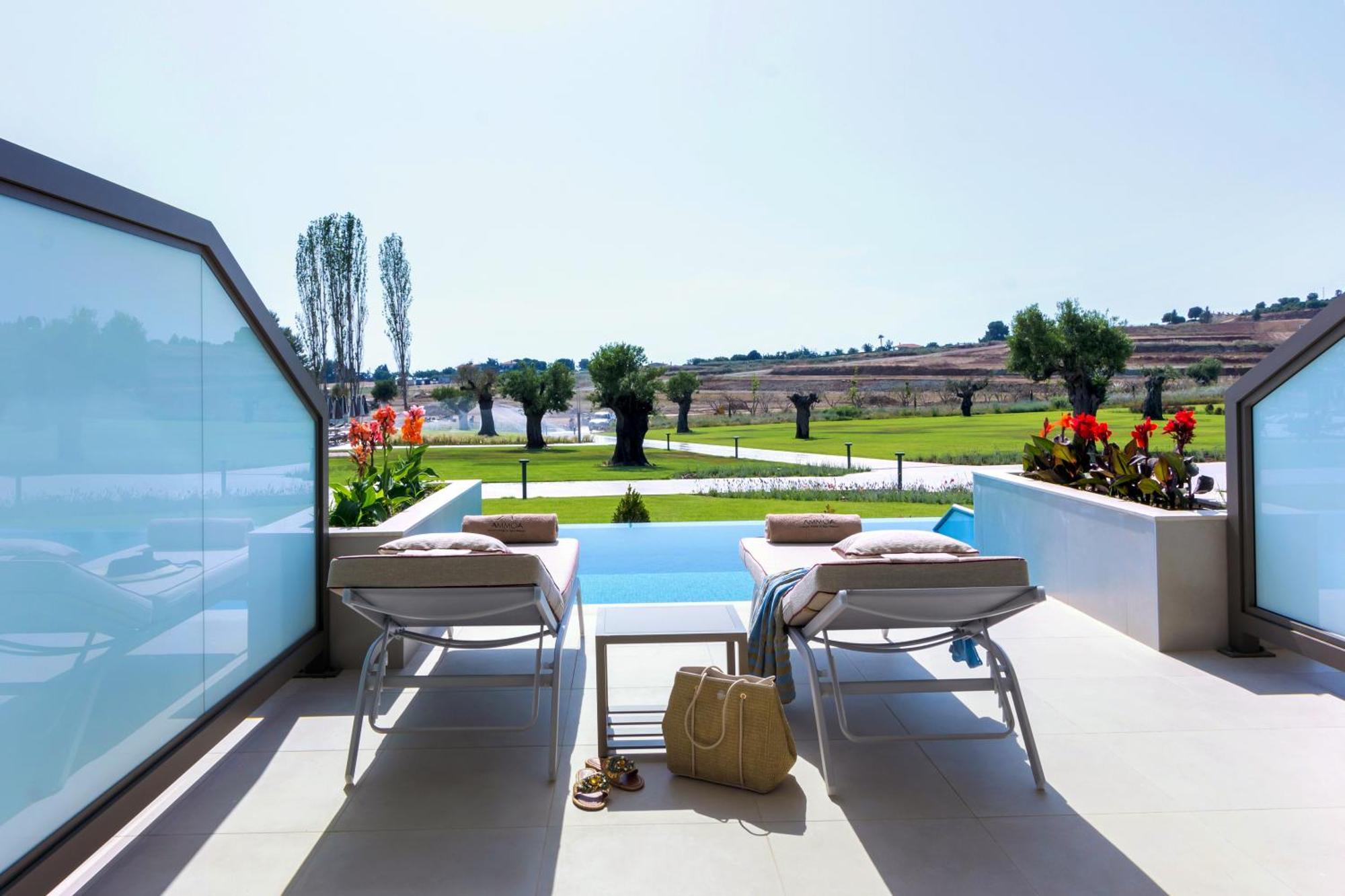 Ammoa Luxury Hotel & Spa Resort Nikiti  Exterior foto The hotel's private pool